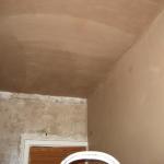 Plastering Day 1 - back wall and ceiling done, door wall prep