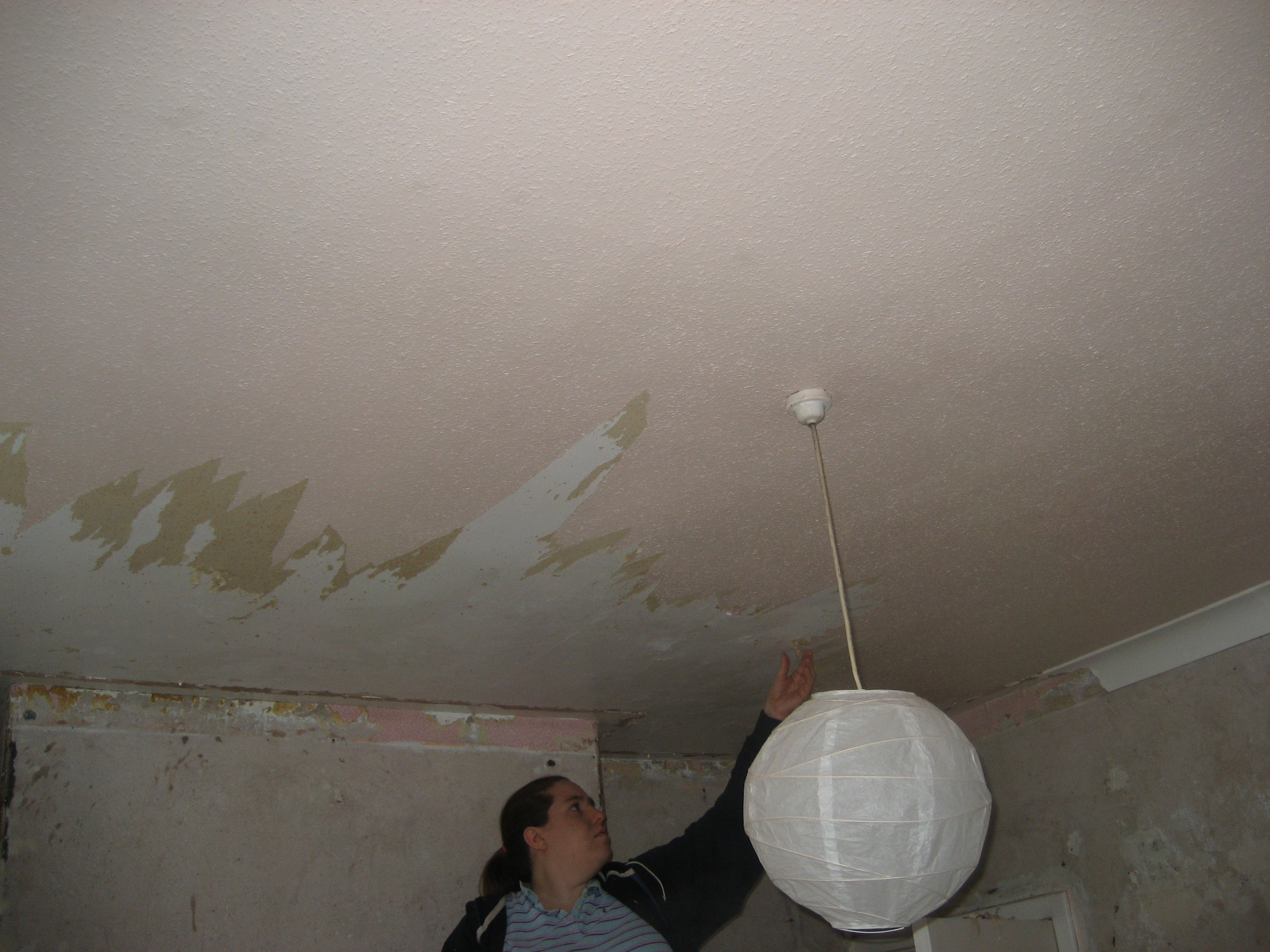 Kerri stripping the ceiling again