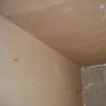 Plastering Day 1 - back wall and ceiling done (looking at window wall)