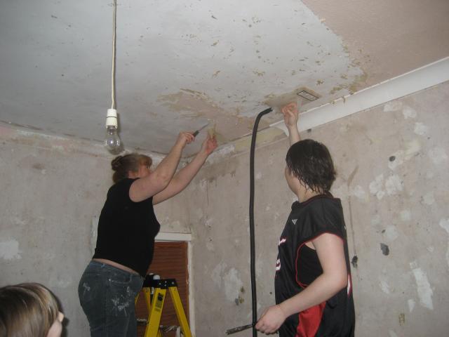 Mum and Andy helping out ... the ceiling really was a beast